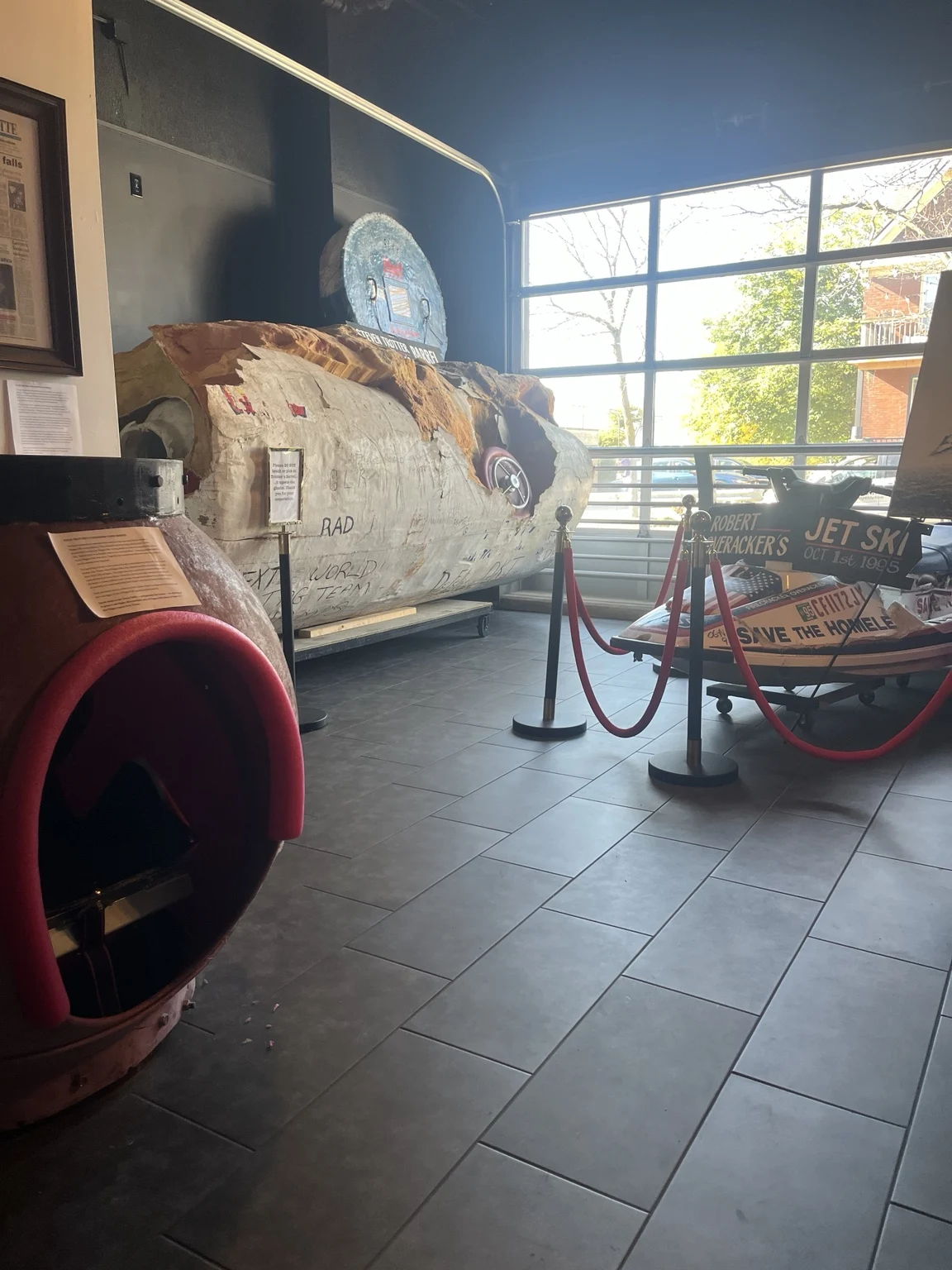 Steve Trotter’s barrels and Robert Overracker’s jet ski displayed together inside The Daredevil Museum